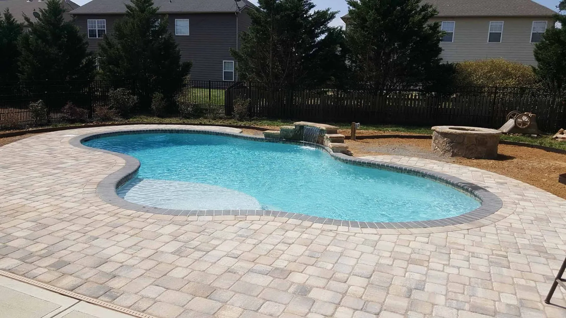 A custom concrete pool built by CPC Pools