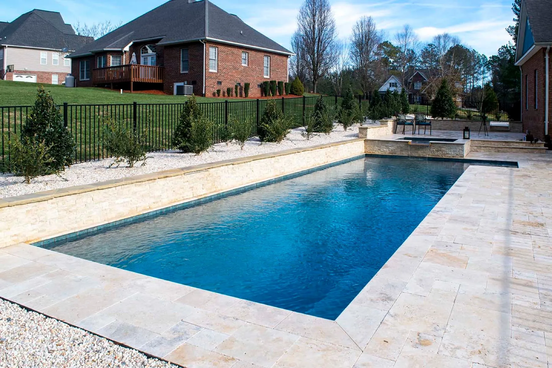 A custom concrete pool built by CPC Pools