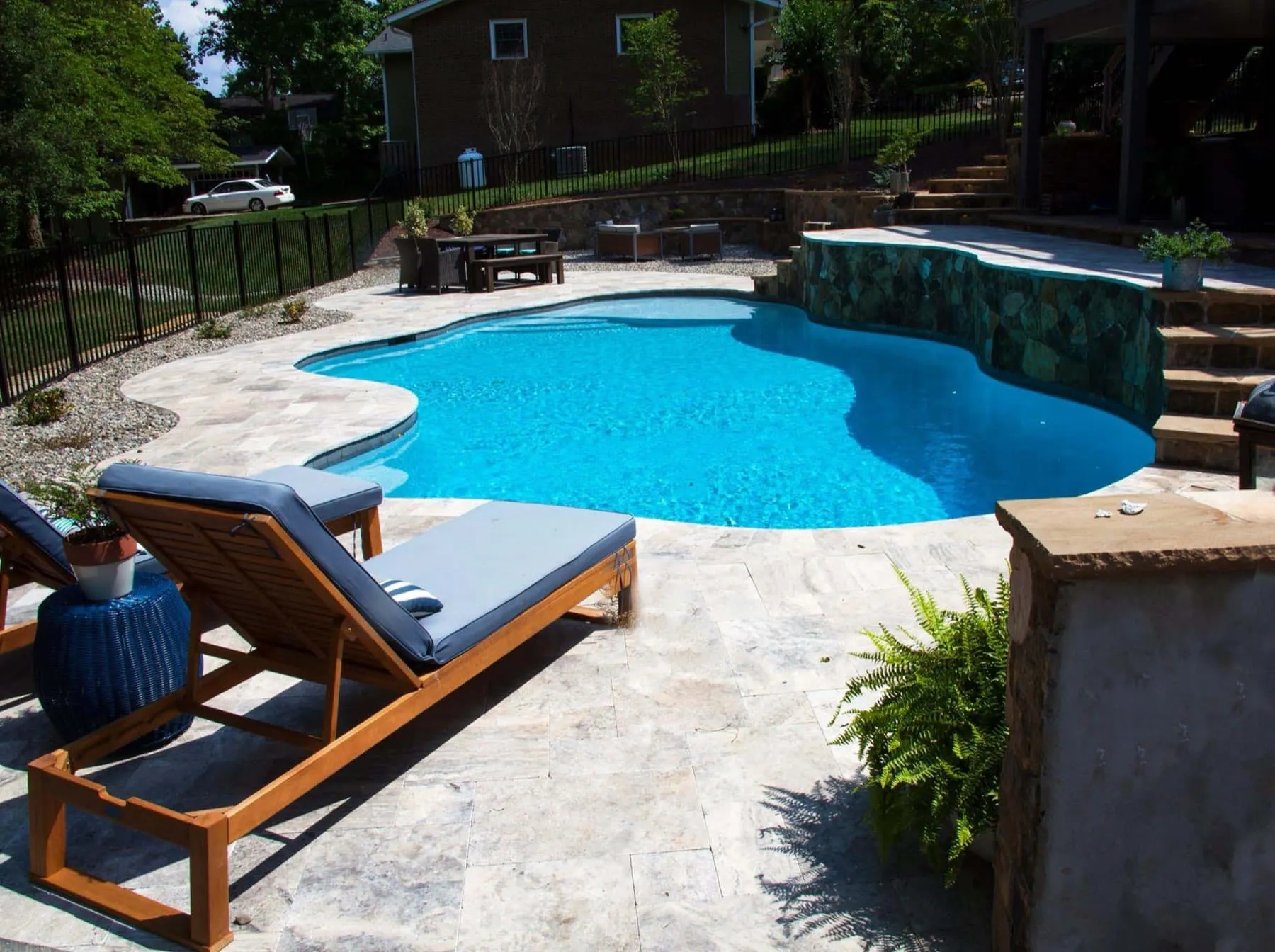 A custom concrete pool built by CPC Pools