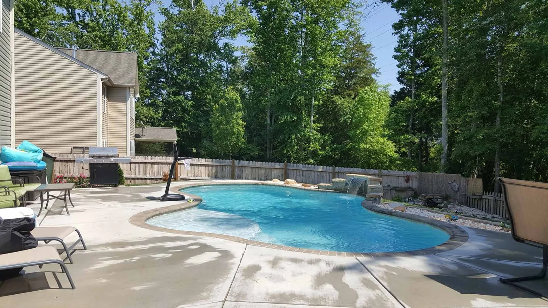 A custom concrete pool built by CPC Pools