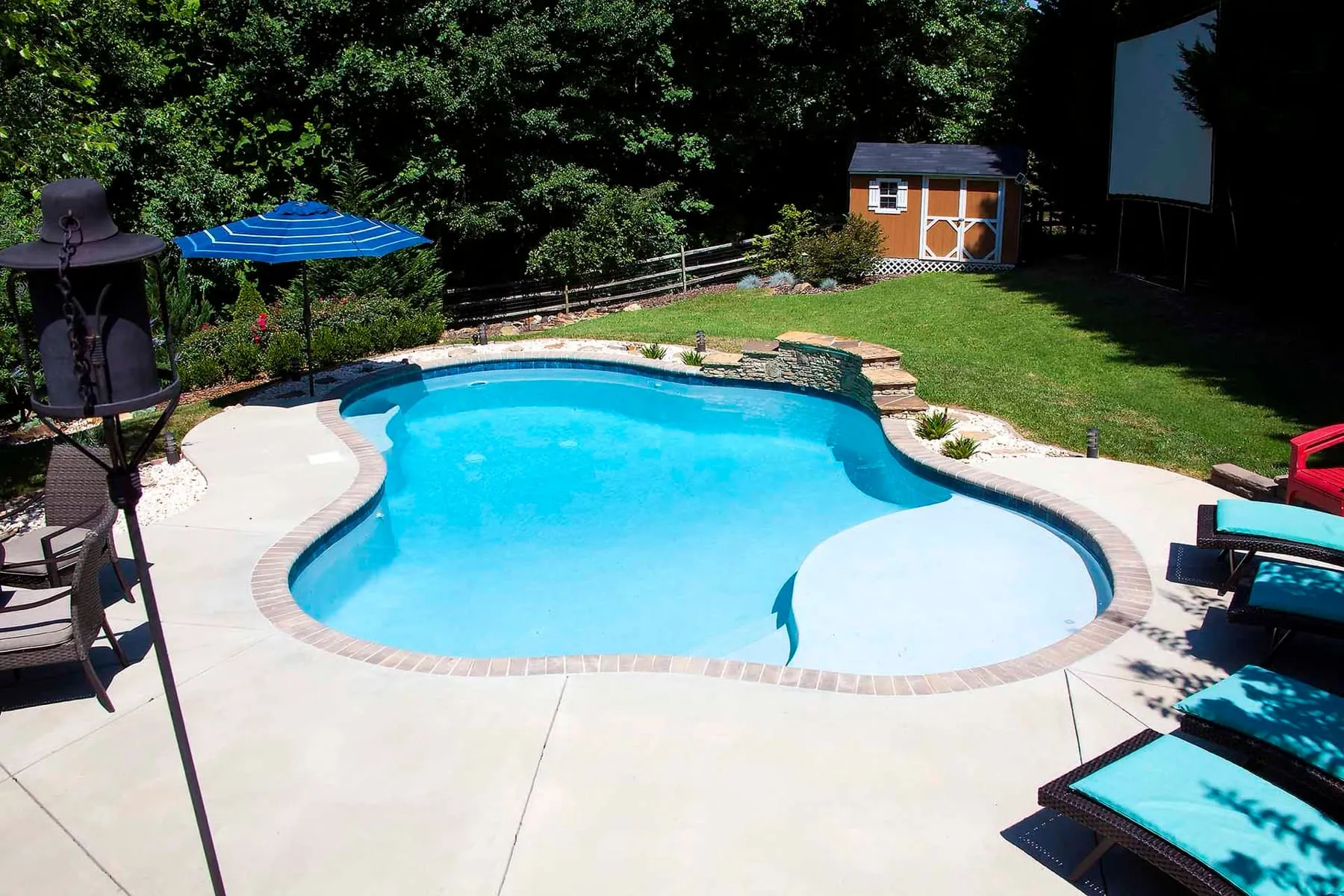 A custom concrete pool built by CPC Pools