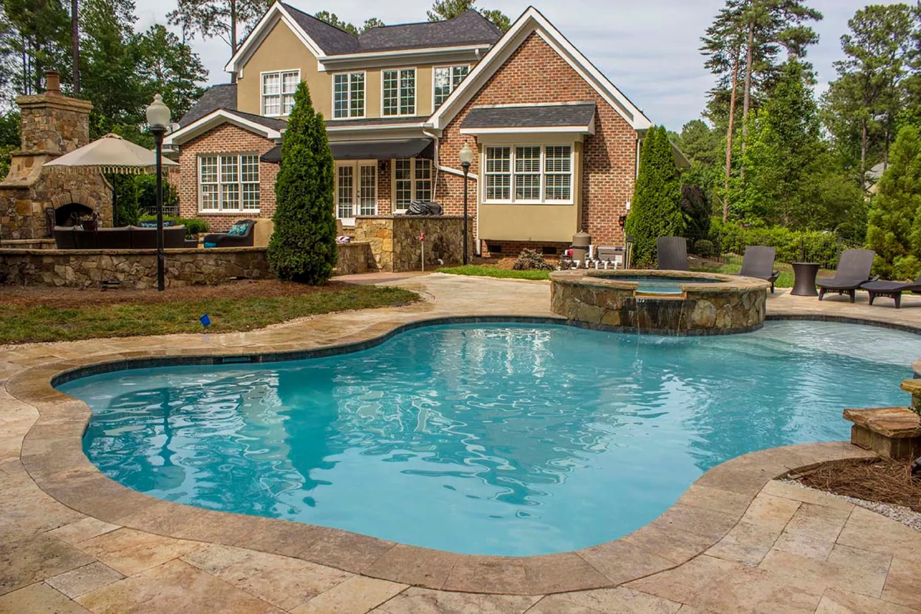 A custom concrete pool built by CPC Pools