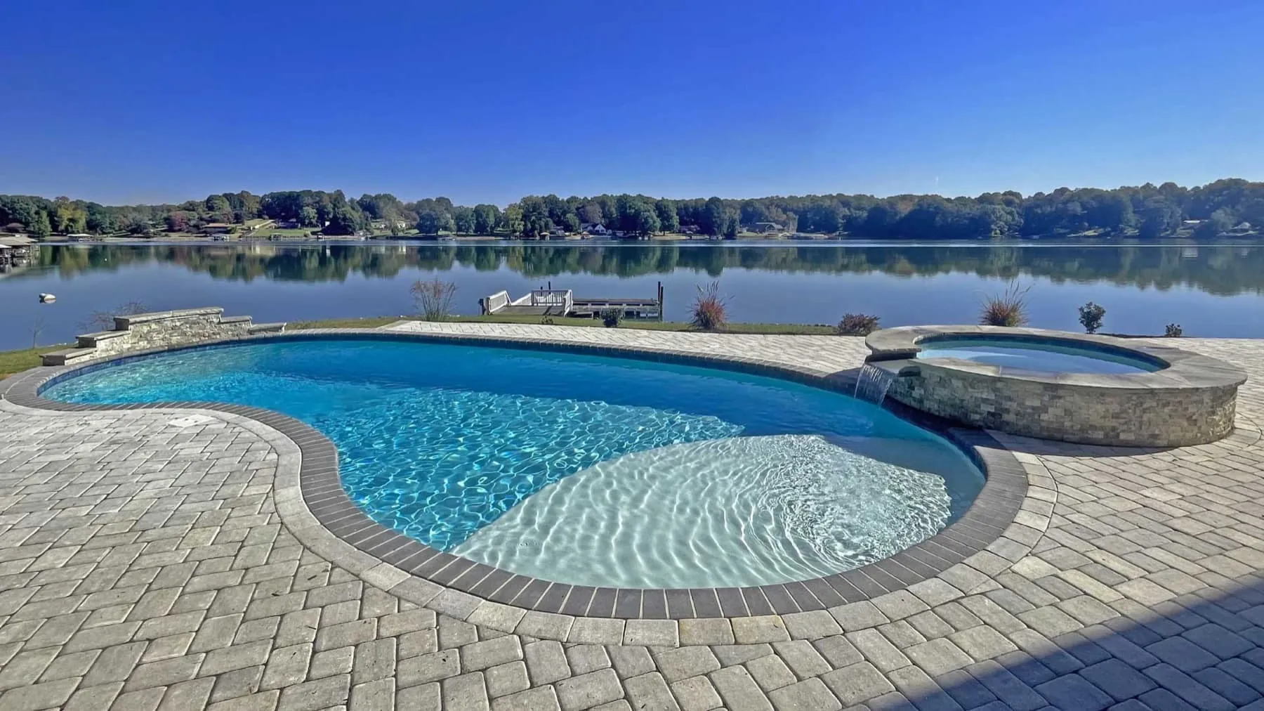 A custom concrete pool built by CPC Pools