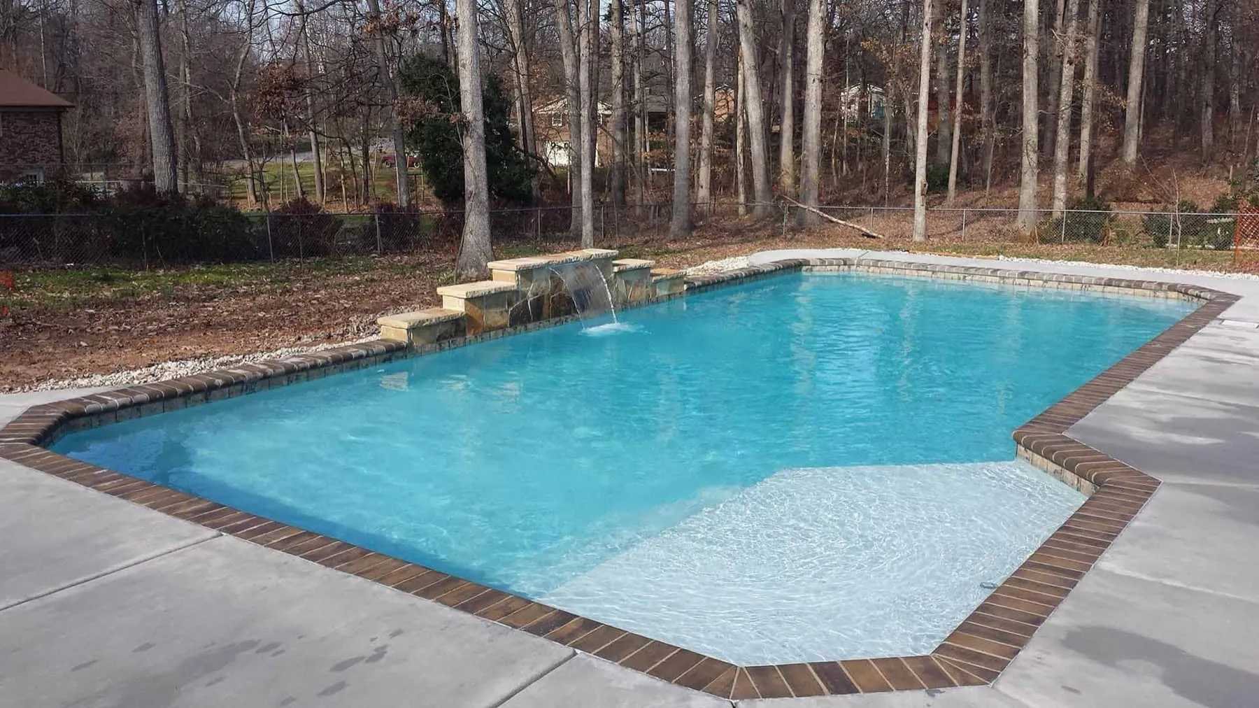 A custom concrete pool built by CPC Pools