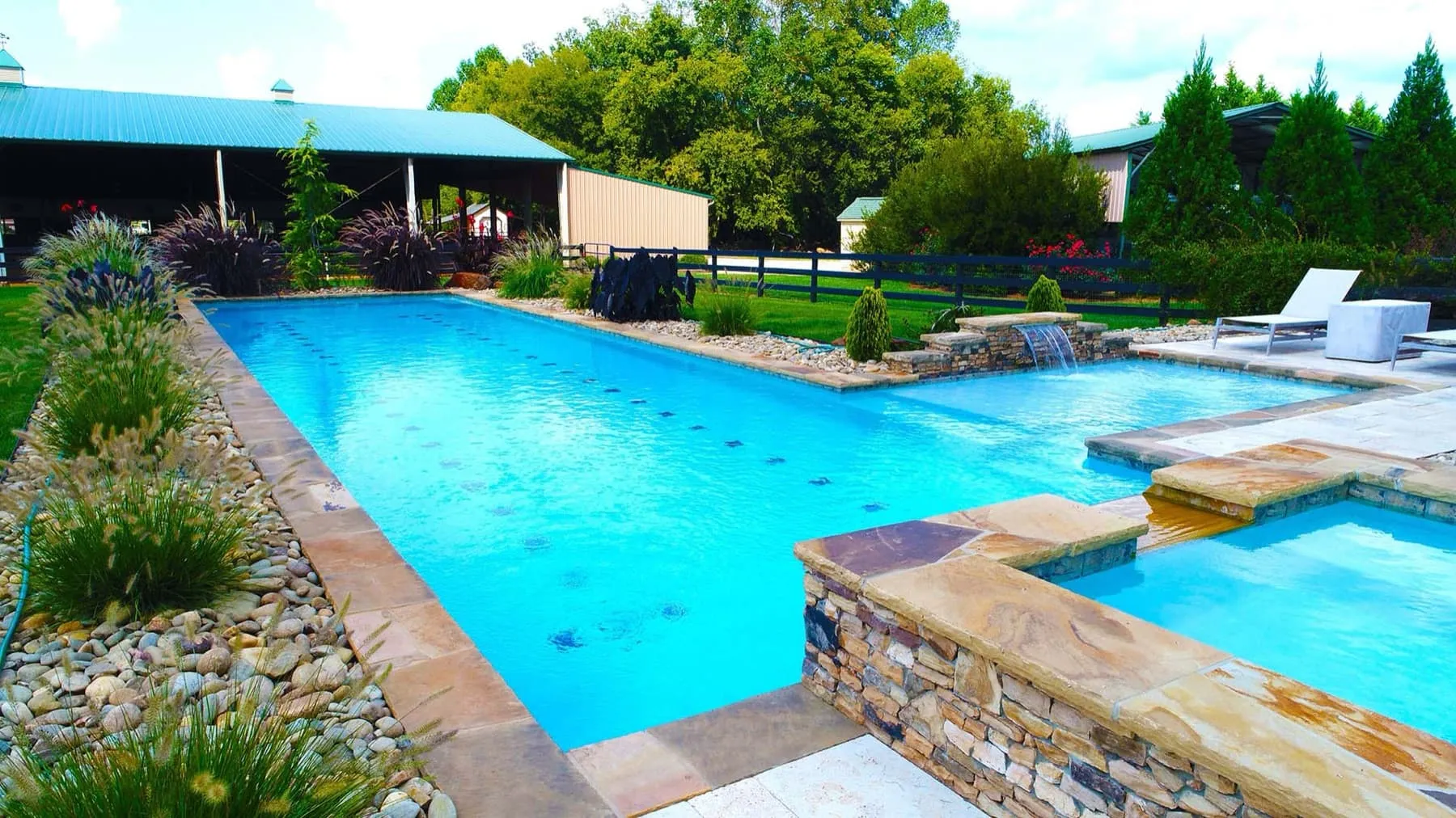 A custom concrete pool built by CPC Pools