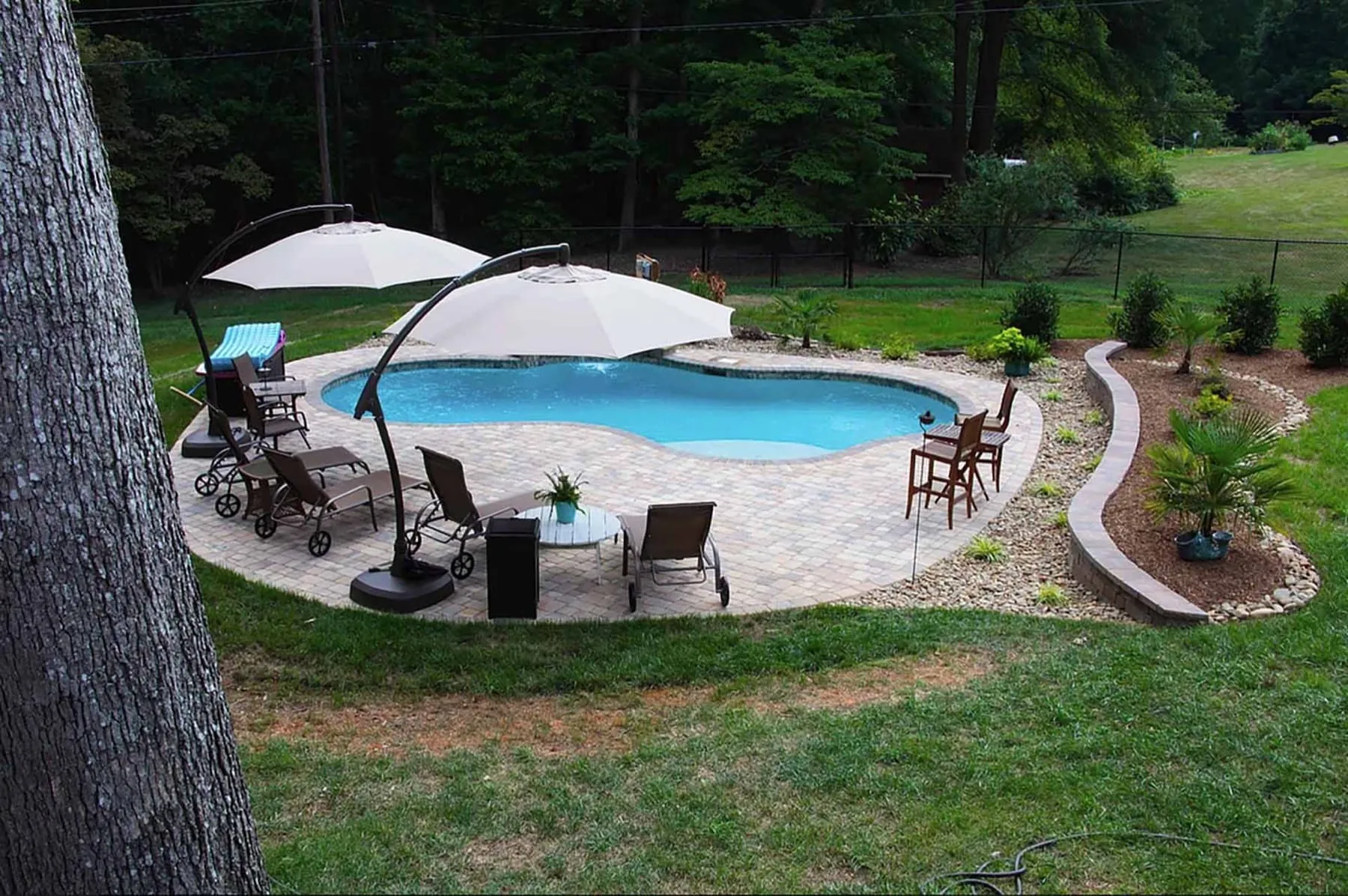 A custom concrete pool built by CPC Pools