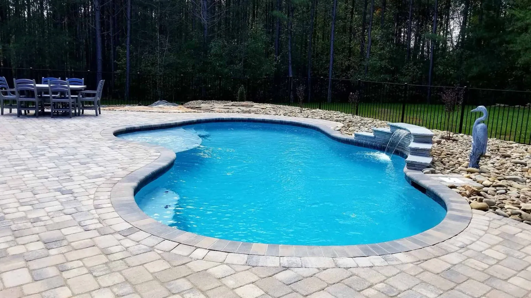 A custom concrete pool built by CPC Pools