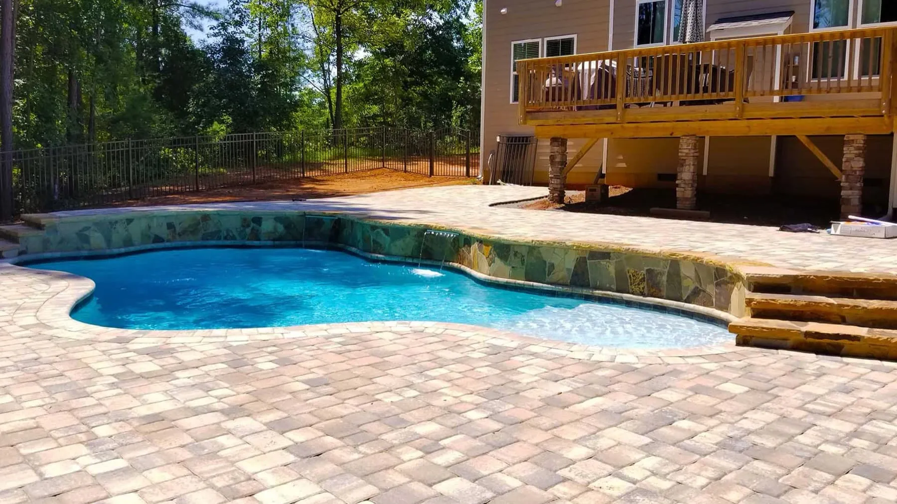A custom concrete pool built by CPC Pools