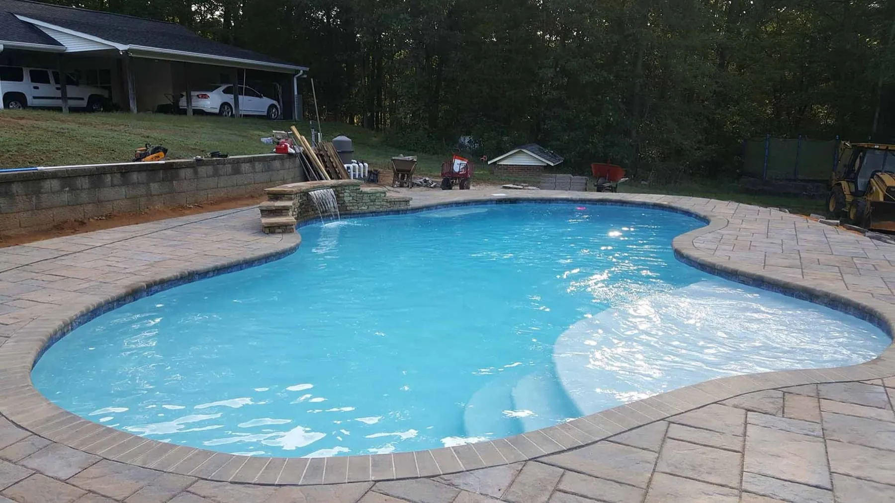 A custom concrete pool built by CPC Pools