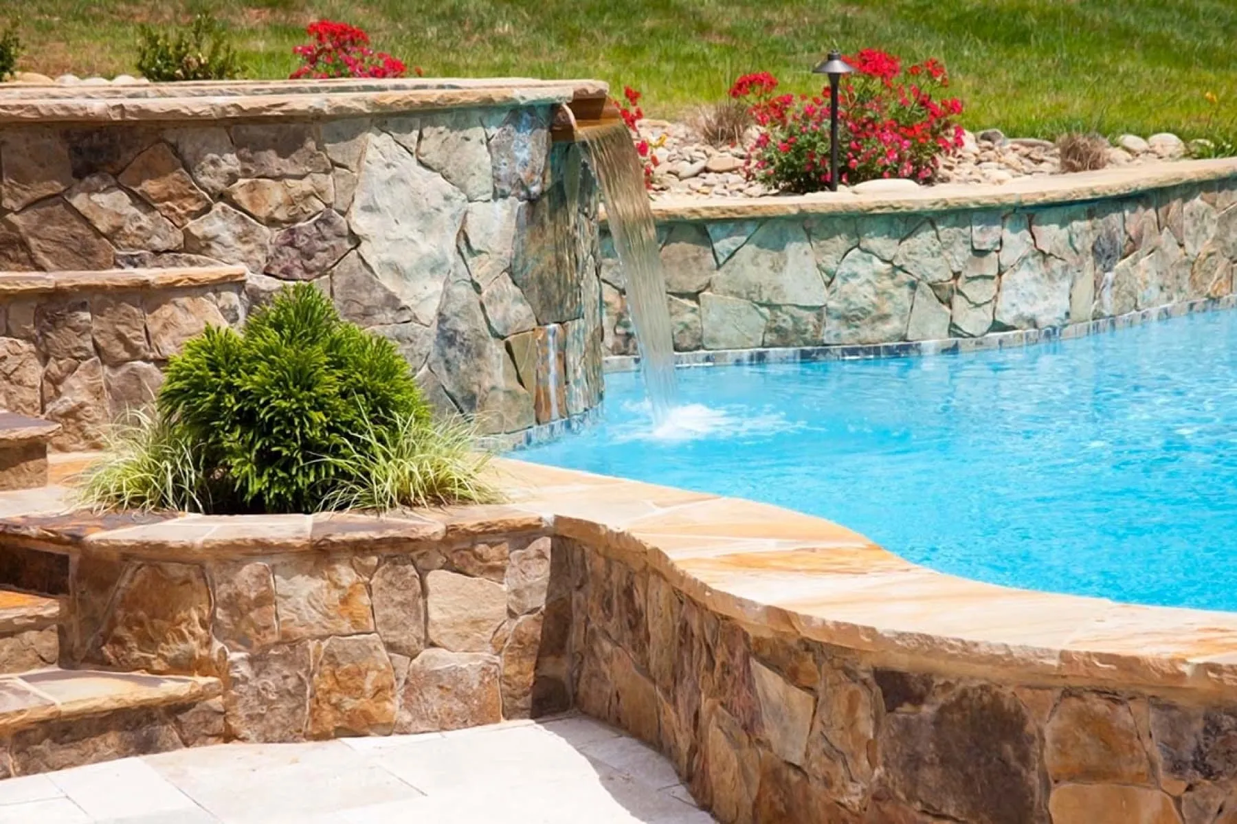 A custom concrete pool built by CPC Pools