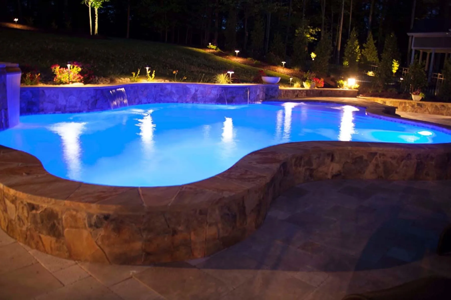 A custom concrete pool built by CPC Pools