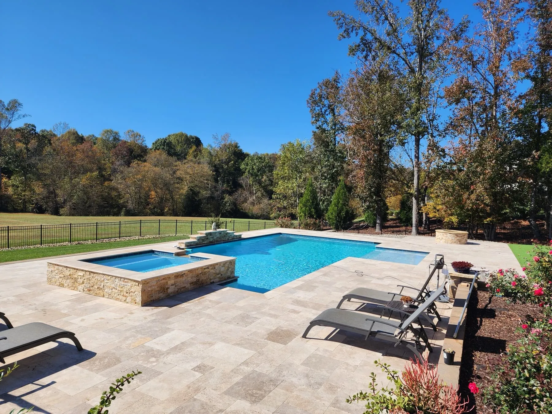 A custom concrete pool built by CPC Pools