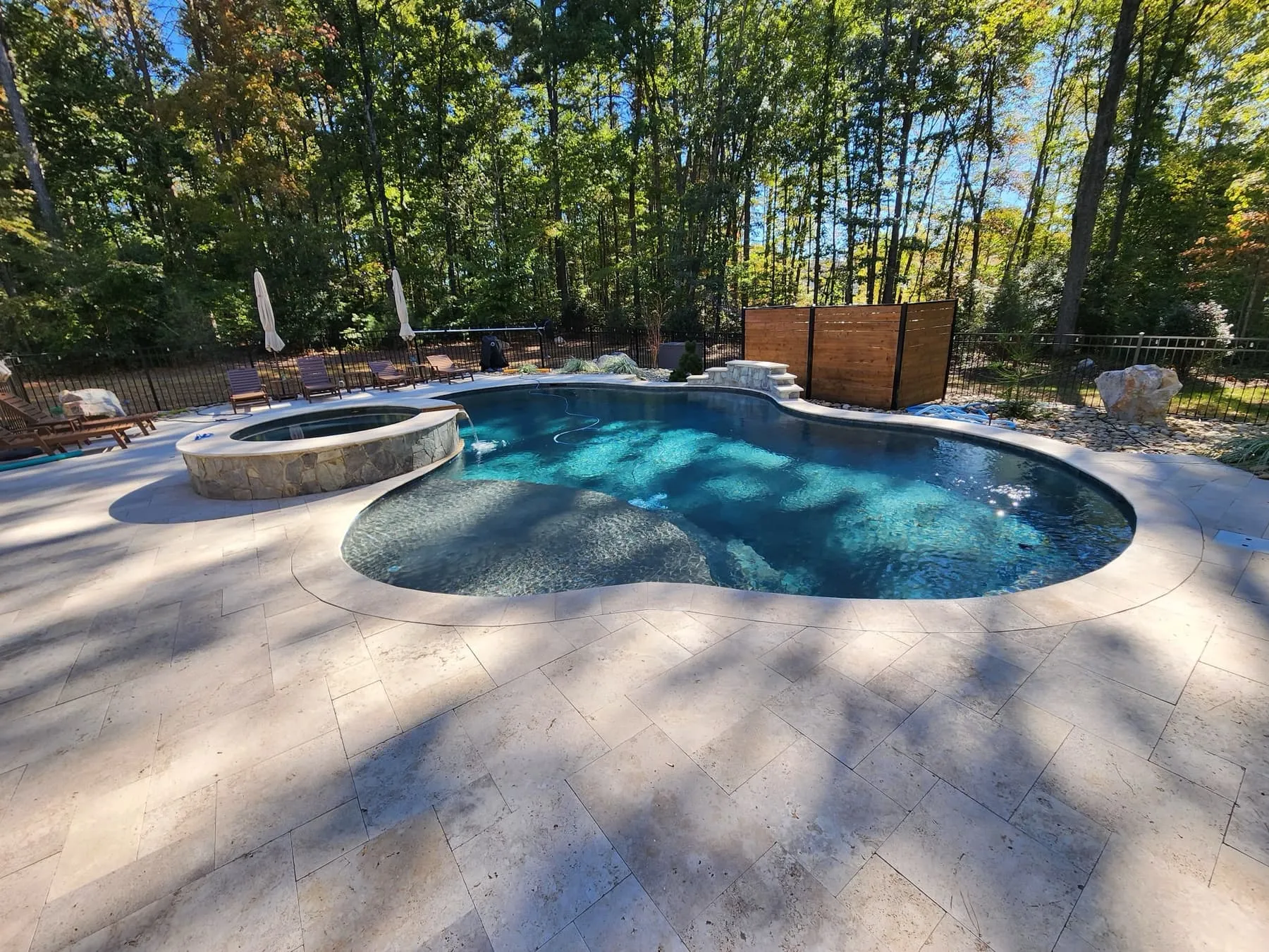 A custom concrete pool built by CPC Pools